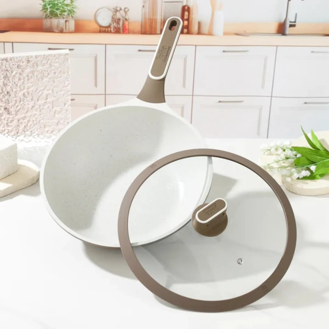 تابه گود جولیا الیت پروف با روکش گرانیتی قهوه ای نچسب سایز 28 سانتی متر به همراه درب، روکش گرانیتی بادوام، دسته های مقاوم در برابر حرارت، تابه پخت و پز همه کاره برای سرخ کردن، تفت دادن و وعده های غذایی روزمره خانواده