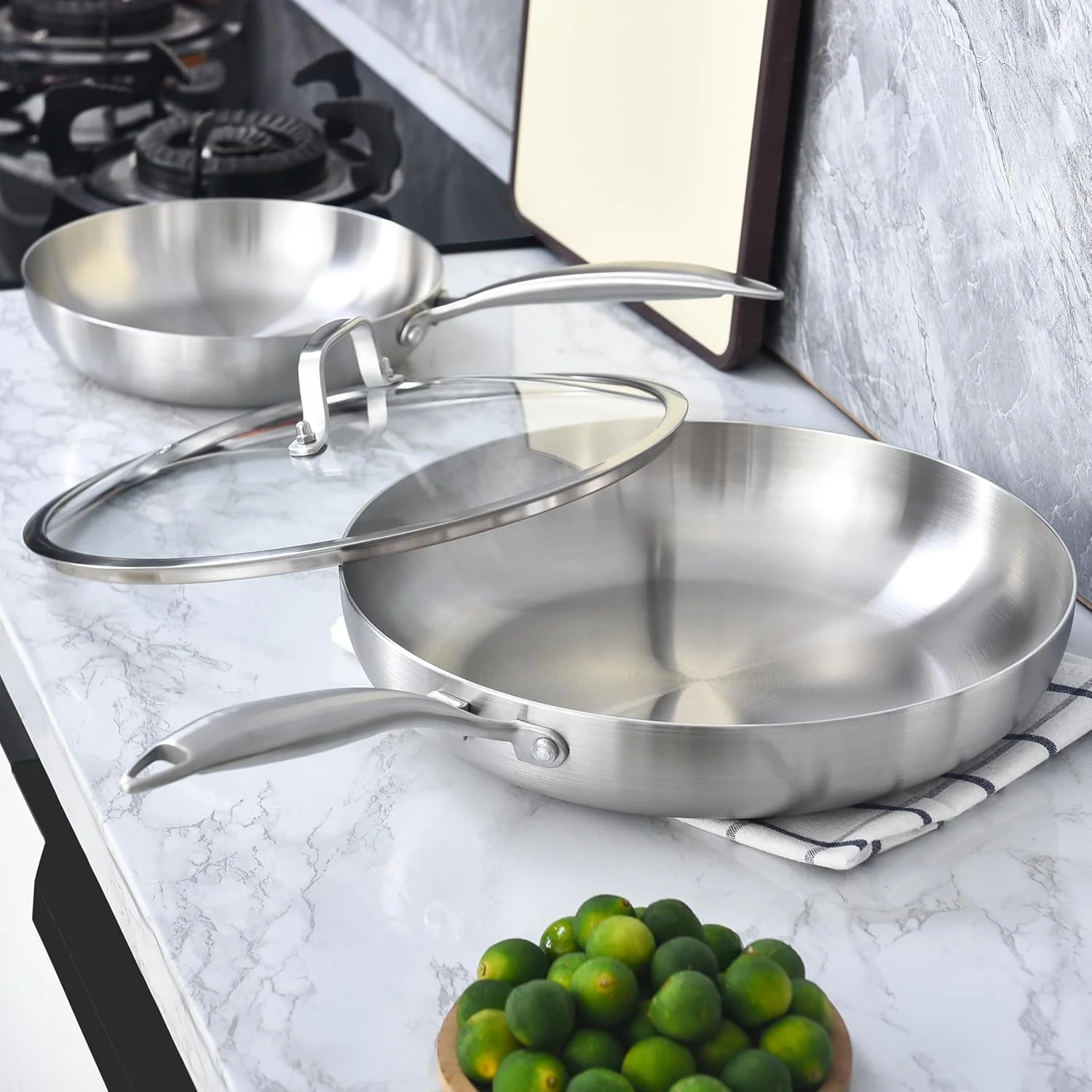 ست تابه استیل سه لایه LOLYKITCH در اندازه های 8.5-10-12 اینچ به همراه درب، تابه گریل، تابه های مناسب پخت القایی، قابل شستشو در ماشین ظرفشویی و استفاده در فر، دسته جداشونده ست تابه استیل سه لایه LOLYKITCH در اندازه های 8.5-10-12 اینچ به همراه درب، تابه گریل، تابه های مناسب پخت القایی، قابل شستشو در ماشین ظرفشویی و استفاده در فر، دسته جداشونده