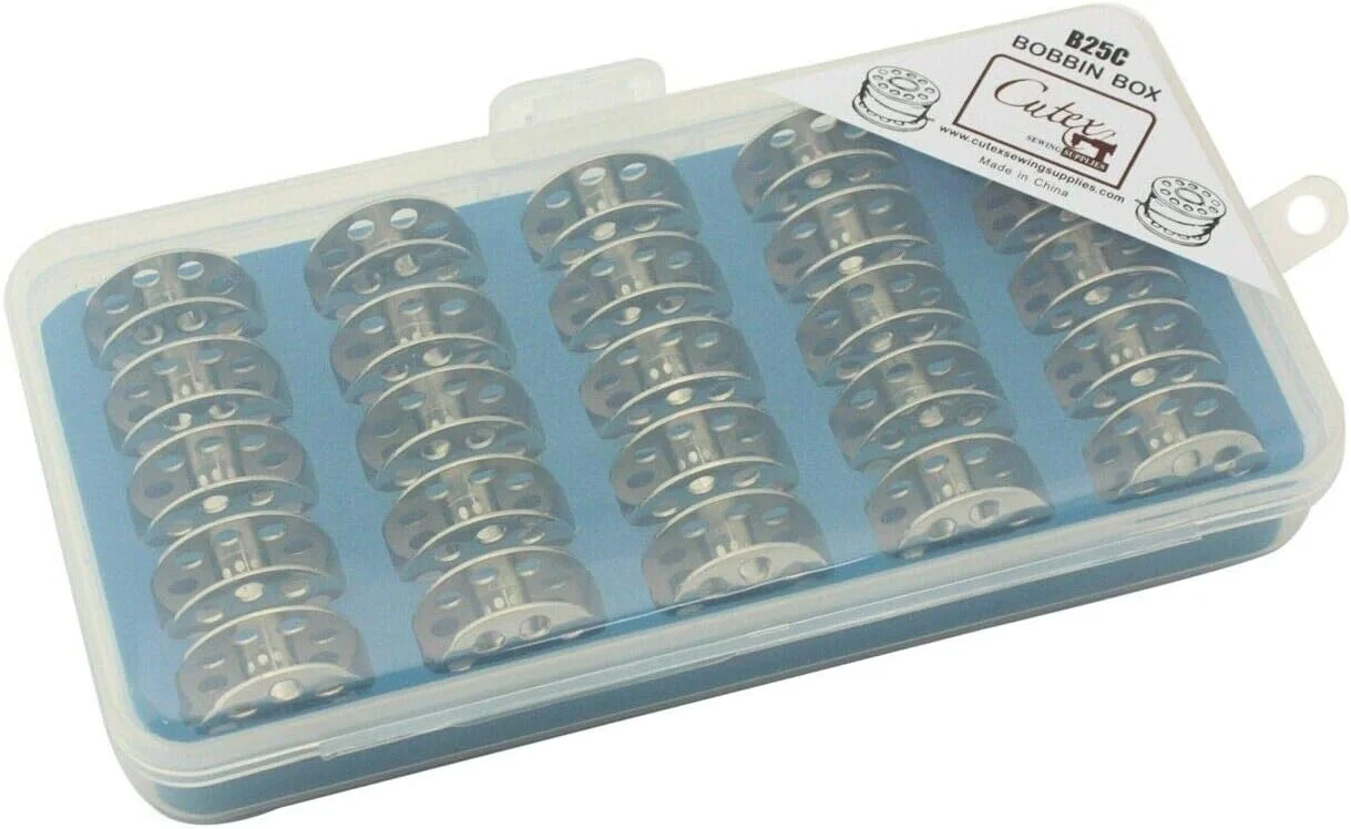 بسته 25 عددی ماسوره Cutex مناسب چرخ خیاطی های Juki DU-141, DU-1181N به همراه جعبه نگهداری بسته 25 عددی ماسوره Cutex مناسب چرخ خیاطی های Juki DU-141, DU-1181N به همراه جعبه نگهداری