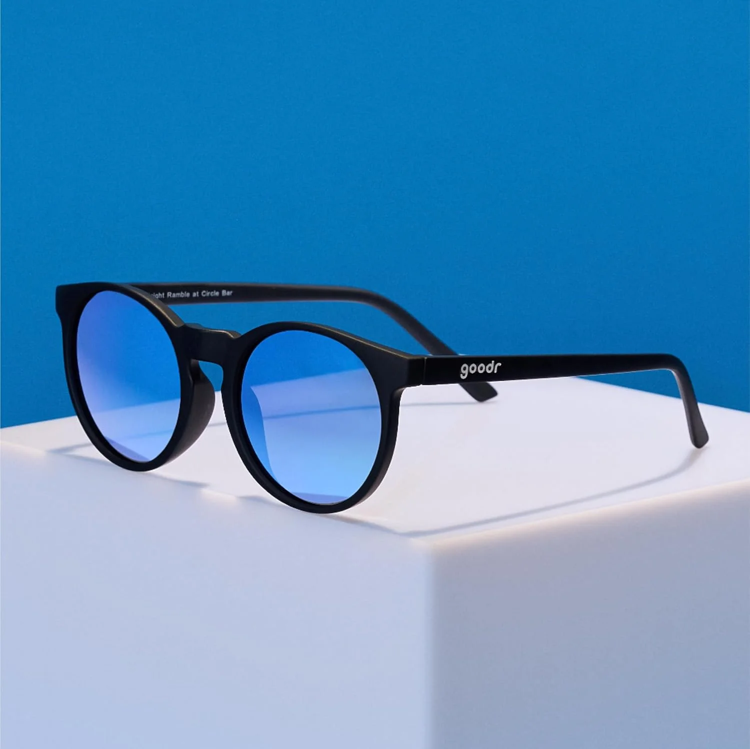 عینک آفتابی گرد پلاریزه گودر مدل Midnight Ramble at Circle Bar، مناسب آقایان و بانوان، سایز کوچک (Circle G)، فریم مشکی یکدست با لنزهای آینه ای آبی، محافظت UV400، بدون لغزش، بدون پرش عینک آفتابی گرد پلاریزه گودر مدل Midnight Ramble at Circle Bar، مناسب آقایان و بانوان، سایز کوچک (Circle G)، فریم مشکی یکدست با لنزهای آینه ای آبی، محافظت UV400، بدون لغزش، بدون پرش