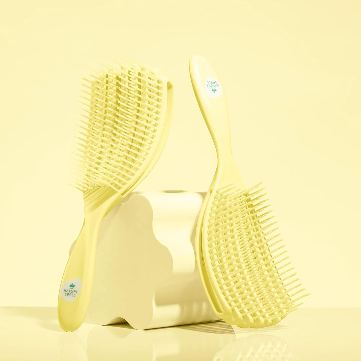 برس موی گره باز کن فلکسی فلو نیچر سپل، رشته های انعطاف پذیر برای برس زدن ملایم، از بین برنده گره ها و کاهش شکستگی مو، مناسب برای انواع مو، زرد