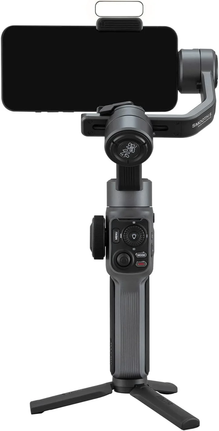 لرزشگیر موبایل ژیون اسموث 5 کمبو به همراه نور مغناطیسی، کیف حمل و سه پایه، گیمبال تثبیت کننده 3 محوره حرفه ای برای گوشی های هوشمند آیفون 14 پرو مکس پلاس 13 12 11 X XS XR Mini SE 8 7 و تلفن های همراه اندروید لرزشگیر موبایل ژیون اسموث 5 کمبو به همراه نور مغناطیسی، کیف حمل و سه پایه، گیمبال تثبیت کننده 3 محوره حرفه ای برای گوشی های هوشمند آیفون 14 پرو مکس پلاس 13 12 11 X XS XR Mini SE 8 7 و تلفن های همراه اندروید