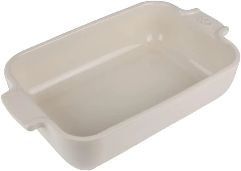 Peugeot Appolia Rectangular Oven Dish 22cm Ecru. Ceramic. Mechanical and Thermal shock resistant. -20° to 250°C. Ergonomic handles.10 year warranty. Made in France.