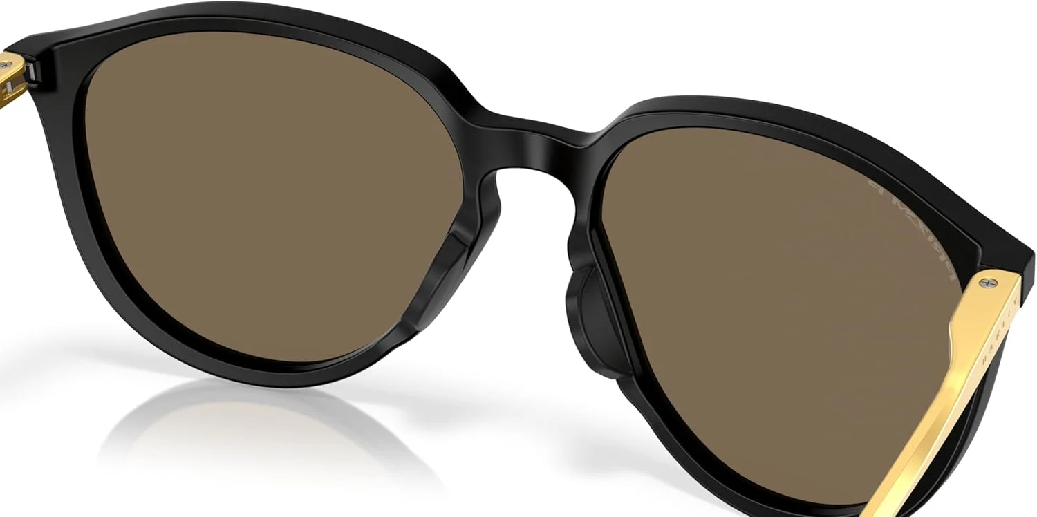 عینک آفتابی زنانه Oakley، فریم مشکی مات، لنزهای پلاریزه خاکستری Prizm، 57 میلی متر عینک آفتابی زنانه Oakley، فریم مشکی مات، لنزهای پلاریزه خاکستری Prizm، 57 میلی متر