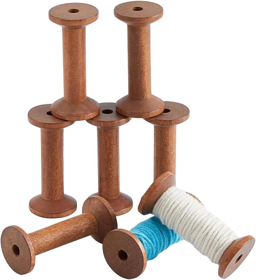 دیکوسمتیک 8 عددی ماسوره چوبی 75x35 میلی‌متری، ماسوره نخ چوبی، ماسوره بافت سیم قهوه‌ای نارگیلی، ماسوره خالی چوبی، ماسوره خیاطی برای ماشین‌های گلدوزی و خیاطی