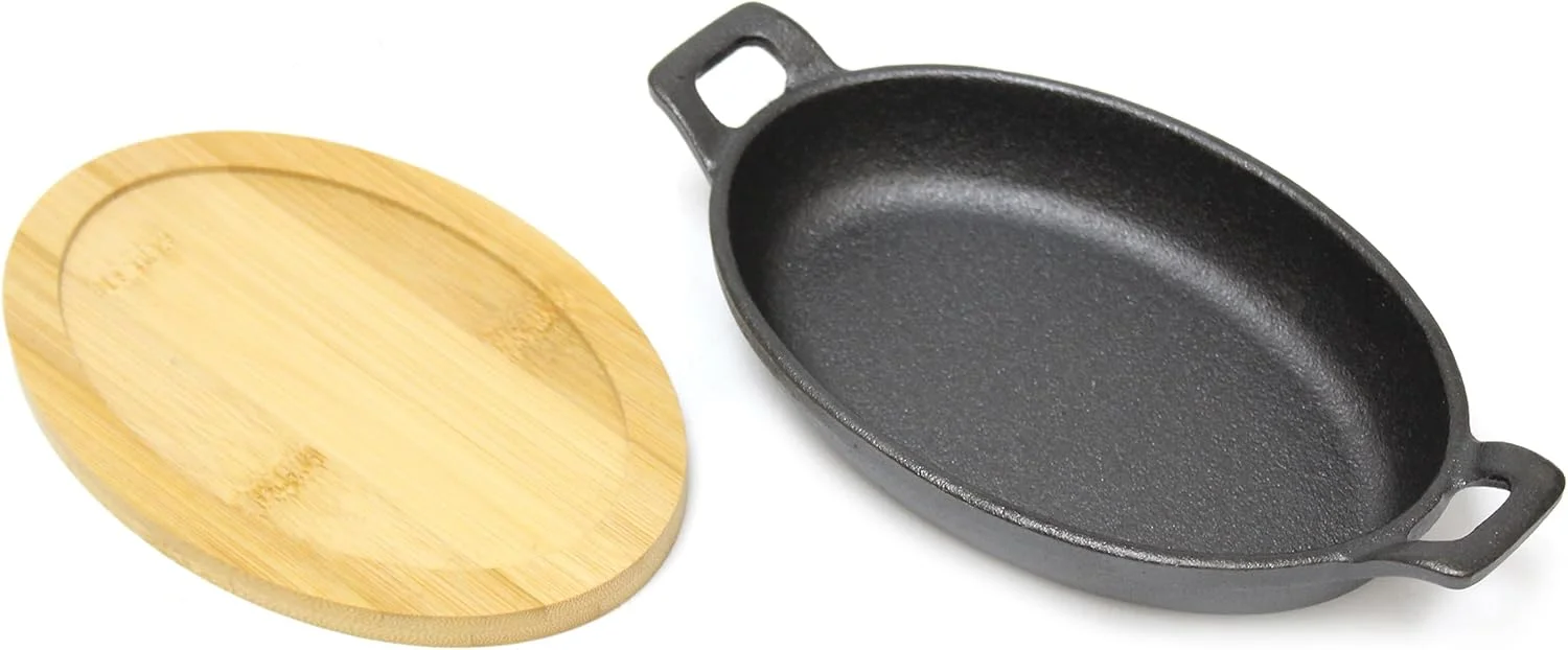 Blackstone Cast Iron Mini Oval Skillet with Wooden Sizzler Plate, 18cm - Ideal for Sizzling, Grilling, and Serving BC14159 Blackstone Cast Iron Mini Oval Skillet with Wooden Sizzler Plate, 18cm - Ideal for Sizzling, Grilling, and Serving BC14159