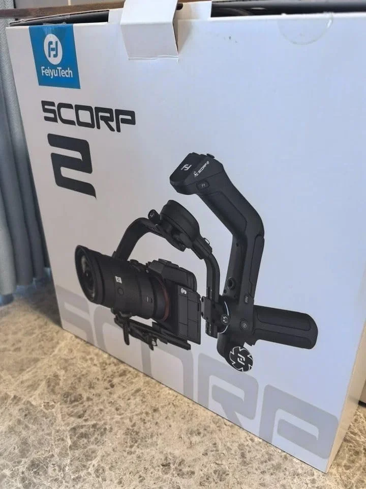 لرزشگیر گیمبال FeiyuTech SCORP 2 برای دوربین های DSLR و بدون آینه، دارای حسگر ردیابی هوشمند یکپارچه، لرزشگیر 3 محوره دوربین برای سونی کانن پاناسونیک نیکون، ظرفیت حمل 2.5 کیلوگرم، صفحه لمسی، فیلمبرداری عمودی لرزشگیر گیمبال FeiyuTech SCORP 2 برای دوربین های DSLR و بدون آینه، دارای حسگر ردیابی هوشمند یکپارچه، لرزشگیر 3 محوره دوربین برای سونی کانن پاناسونیک نیکون، ظرفیت حمل 2.5 کیلوگرم، صفحه لمسی، فیلمبرداری عمودی
