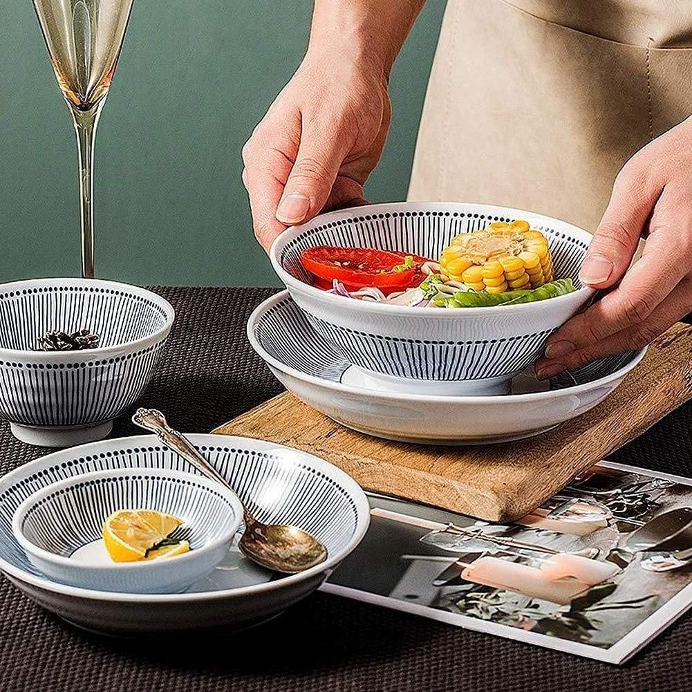 ست ظروف غذاخوری شیک و ظریف، ست ظروف چینی سفید با خطوط راه راه آبی، ست بشقاب و کاسه سرامیکی، ست ظروف منحصر به فرد برای مهمانی ها یا استفاده روزمره، سرویس ست ظروف غذاخوری شیک و ظریف، ست ظروف چینی سفید با خطوط راه راه آبی، ست بشقاب و کاسه سرامیکی، ست ظروف منحصر به فرد برای مهمانی ها یا استفاده روزمره، سرویس