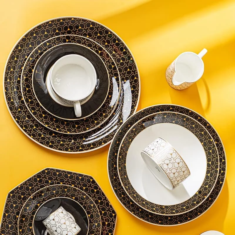 سرویس غذاخوری قو Wondercoast، سرویس ظروف چینی استخوانی درجه یک 40 تکه برای 6 نفر، ست لوکس بشقاب و کاسه آشپزخانه با فنجان. ست ظروف سفید، مشکی و طلایی سرویس غذاخوری قو Wondercoast، سرویس ظروف چینی استخوانی درجه یک 40 تکه برای 6 نفر، ست لوکس بشقاب و کاسه آشپزخانه با فنجان. ست ظروف سفید، مشکی و طلایی