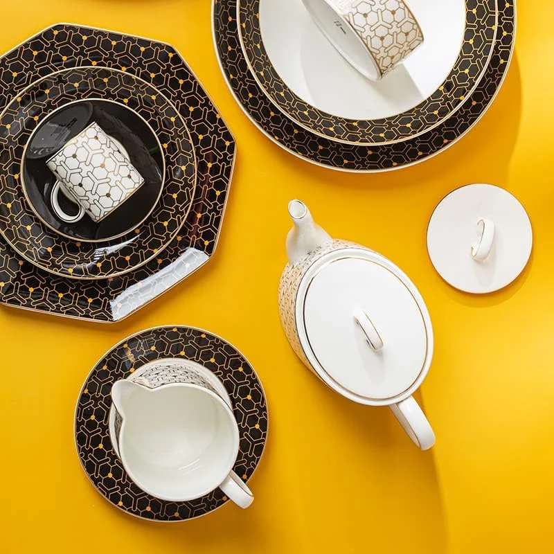 سرویس غذاخوری قو Wondercoast، سرویس ظروف چینی استخوانی درجه یک 40 تکه برای 6 نفر، ست لوکس بشقاب و کاسه آشپزخانه با فنجان. ست ظروف سفید، مشکی و طلایی سرویس غذاخوری قو Wondercoast، سرویس ظروف چینی استخوانی درجه یک 40 تکه برای 6 نفر، ست لوکس بشقاب و کاسه آشپزخانه با فنجان. ست ظروف سفید، مشکی و طلایی