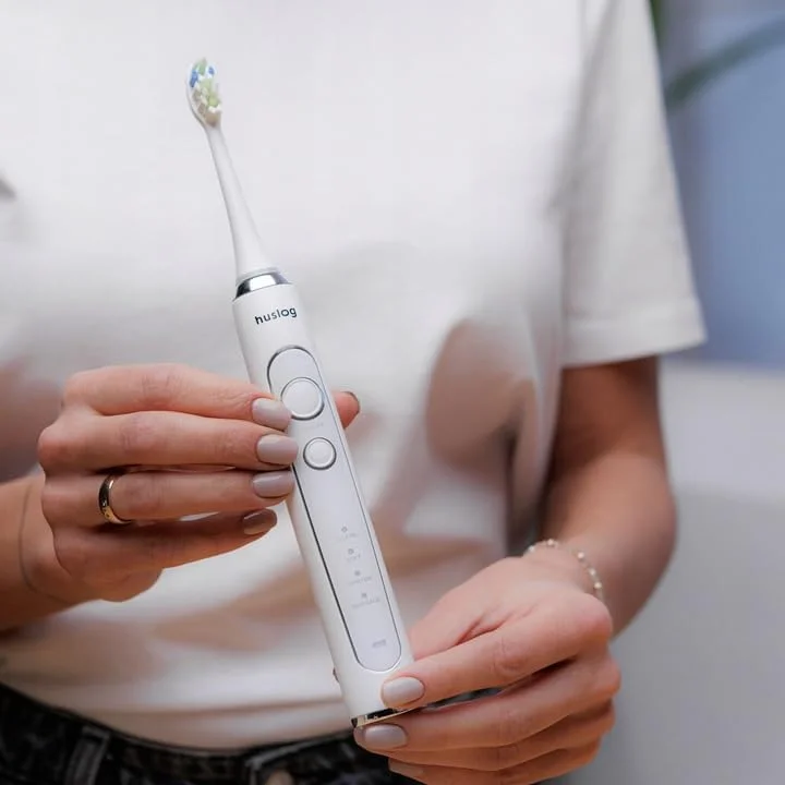 مسواک برقی هاسلاگ با 4 حالت تمیز کردن، استند شارژ و 2 سری مسواک - سفید