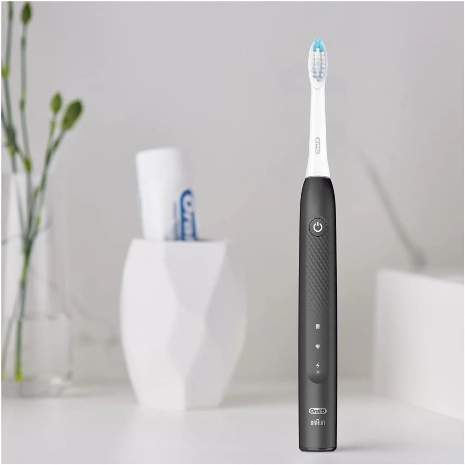 مسواک برقی صوتی Oral-B Pulsonic Slim Clean 2000، 2 حالت تمیز کردن برای مراقبت از دندان و لثه های سالم با تایمر، هدیه برای آقایان/خانم ها، طراحی شده توسط Braun، مشکی مسواک برقی صوتی Oral-B Pulsonic Slim Clean 2000، 2 حالت تمیز کردن برای مراقبت از دندان و لثه های سالم با تایمر، هدیه برای آقایان/خانم ها، طراحی شده توسط Braun، مشکی