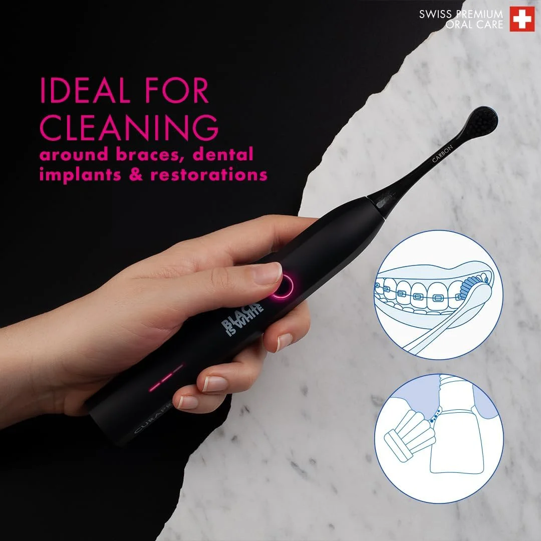 مسواک برقی بزرگسالان Curaprox Hydrosonic Black Is White با 3 سطح تمیز کنندگی هیدروسونیک - قابل شارژ مسواک برقی بزرگسالان Curaprox Hydrosonic Black Is White با 3 سطح تمیز کنندگی هیدروسونیک - قابل شارژ