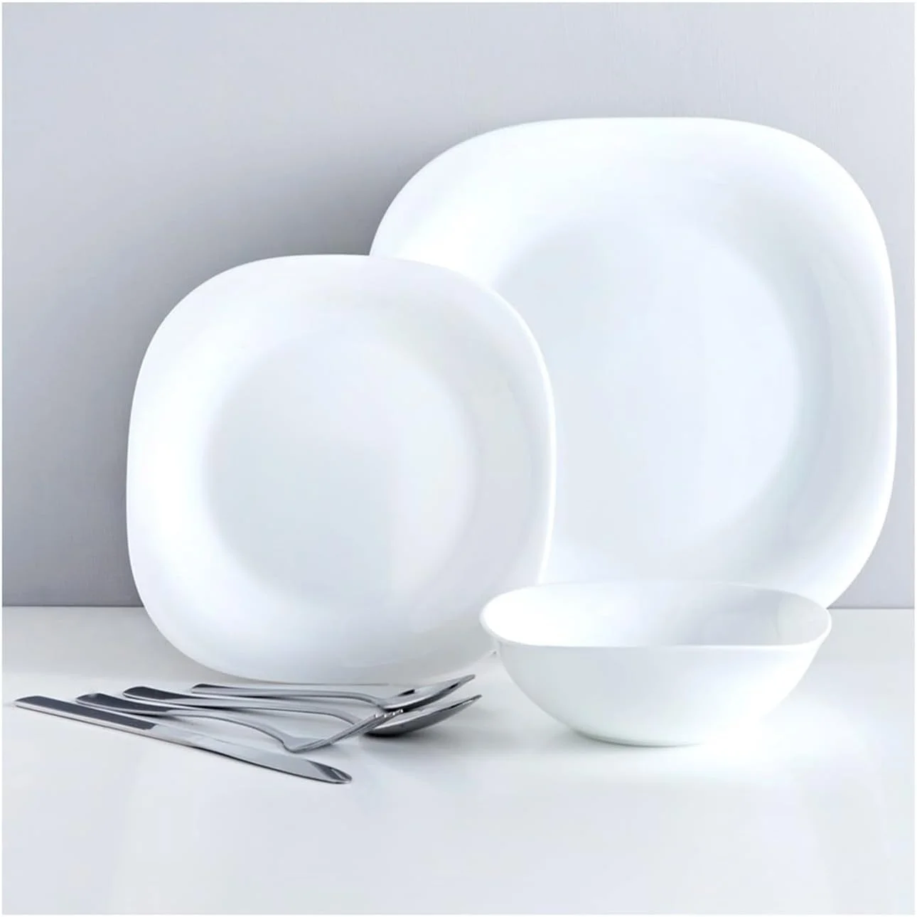 سرویس غذاخوری 20 پارچه اپال هوزی شامل 6 عدد بشقاب غذاخوری، 6 عدد بشقاب دسرخوری، 6 عدد کاسه و 2 عدد کاسه سرو