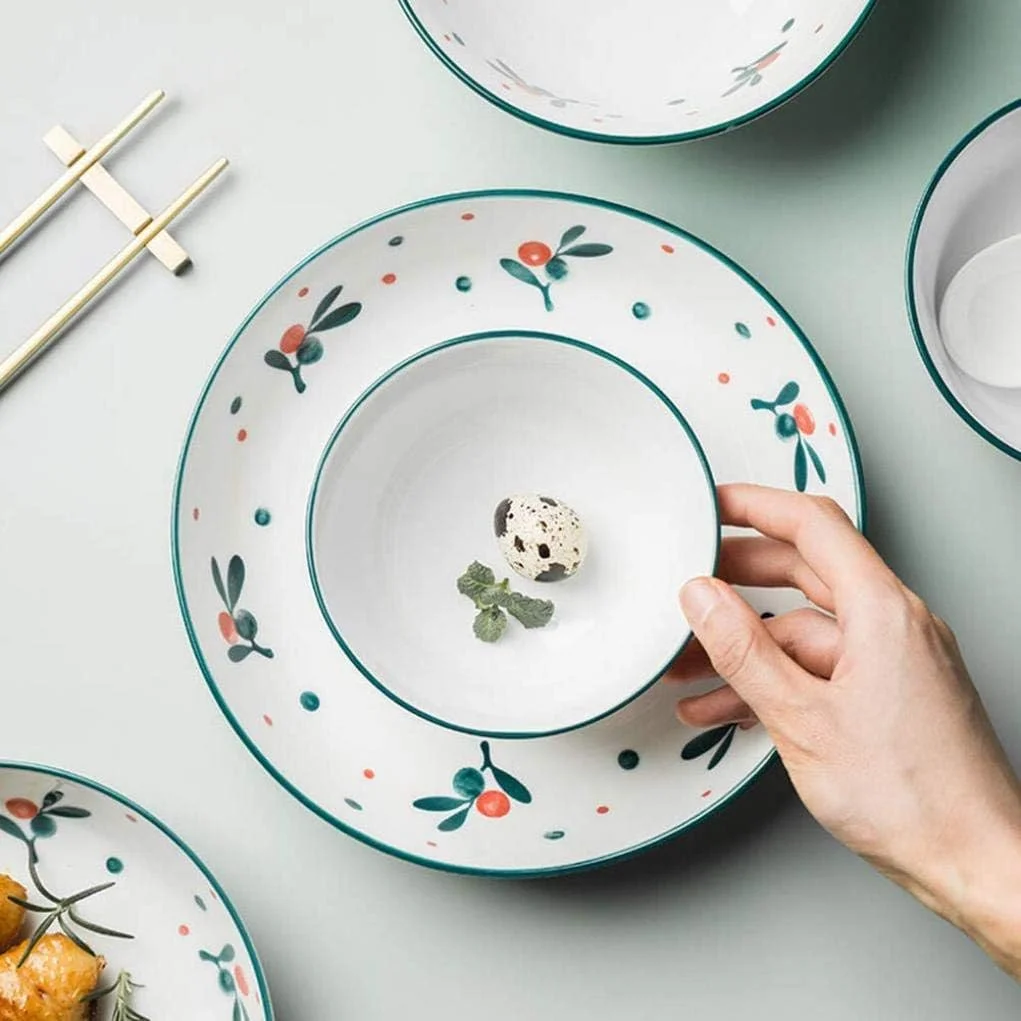 ست ظروف غذاخوری طرح گلدار، ست 18 پارچه سرامیکی شامل بشقاب، کاسه و قاشق، مناسب برای 6 نفر ست ظروف غذاخوری طرح گلدار، ست 18 پارچه سرامیکی شامل بشقاب، کاسه و قاشق، مناسب برای 6 نفر