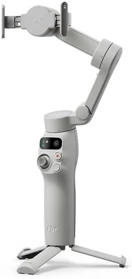 DJI Osmo Mobile 7 Gimbal Stabilizer for iPhone, Android, Built-in Tripod, Comfortable Grip, 3-Axis Phone Gimbal, ActiveTrack 7.0, OneTap Edit, Phone Charging - Grey DJI Osmo Mobile 7 Gimbal Stabilizer for iPhone, Android, Built-in Tripod, Comfortable Grip, 3-Axis Phone Gimbal, ActiveTrack 7.0, OneTap Edit, Phone Charging - Grey