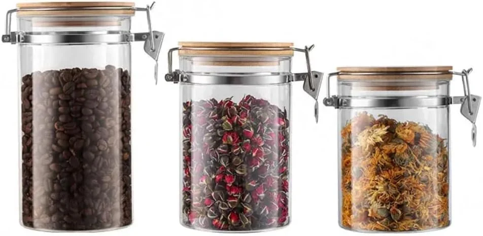 ست 3 تایی ظروف شیشه ای نگهداری مواد غذایی با درب گیره ای چوبی - ظرف تزئینی و نظم دهنده برای مواد غذایی - ظرف حبوبات مدرن و معاصر مناسب آشپزخانه - 800 میلی لیتر، 1000 میلی لیتر، 1400 میلی لیتر