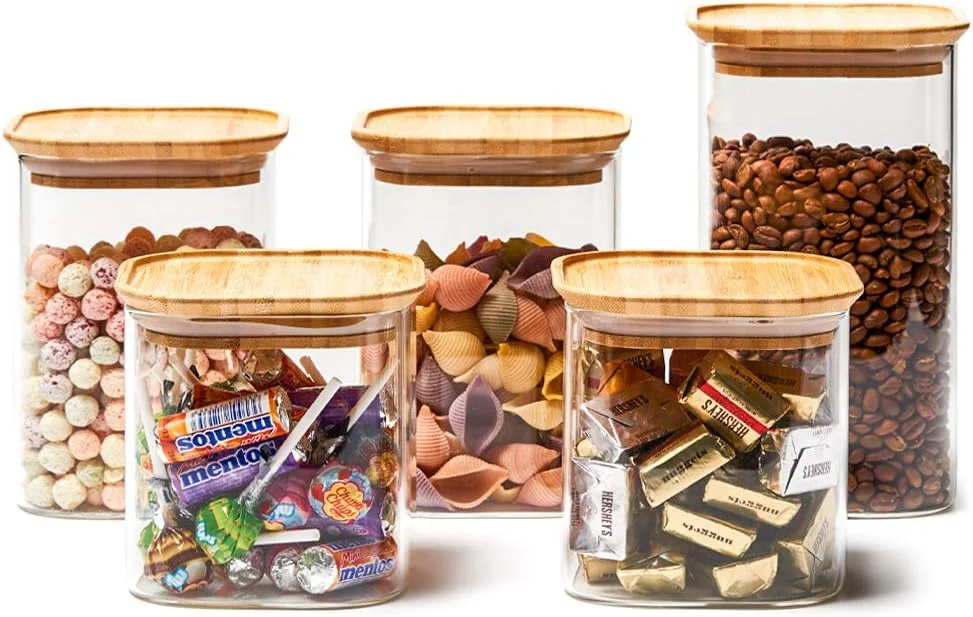 ست 5 تکه شیشه ای شفاف EZOWare، ظروف مربعی درب دار برای نگهداری مواد غذایی مانند آبنبات، کلوچه، برنج، شکر، آرد، پاستا و آجیل - 710ml / 1005ml / 1300ml ست 5 تکه شیشه ای شفاف EZOWare، ظروف مربعی درب دار برای نگهداری مواد غذایی مانند آبنبات، کلوچه، برنج، شکر، آرد، پاستا و آجیل - 710ml / 1005ml / 1300ml