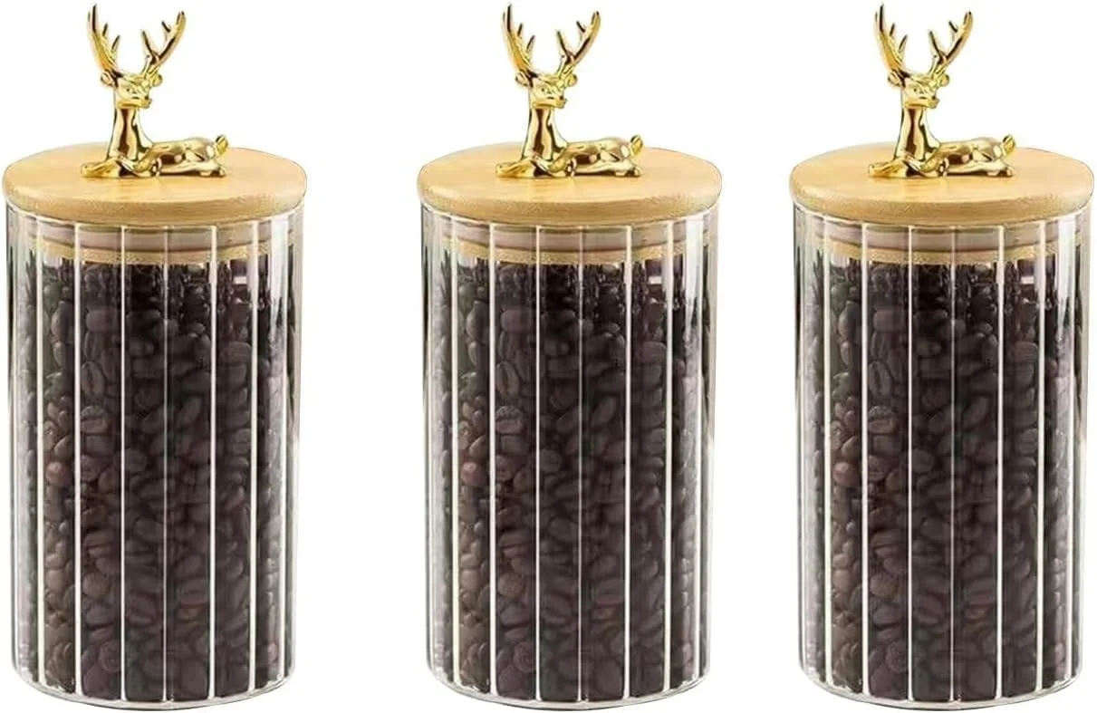 ست 3 تایی ظروف شیشه ای نگهداری مواد غذایی با درب بامبو و دسته گوزن طلایی - ظروف درب دار برای قهوه، چای، ادویه جات، تنقلات، ظروف تزئینی آشپزخانه (شفاف، 600 میلی لیتر) ست 3 تایی ظروف شیشه ای نگهداری مواد غذایی با درب بامبو و دسته گوزن طلایی - ظروف درب دار برای قهوه، چای، ادویه جات، تنقلات، ظروف تزئینی آشپزخانه (شفاف، 600 میلی لیتر)