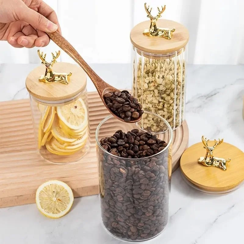 ست 3 تایی ظروف شیشه ای نگهداری مواد غذایی با درب بامبو و دسته گوزن طلایی - ظروف درب دار برای قهوه، چای، ادویه جات، تنقلات، ظروف تزئینی آشپزخانه (شفاف، 600 میلی لیتر)