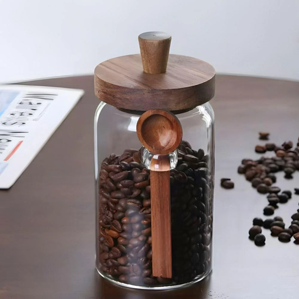 ظرف شیشه ای با درب چوبی و پیمانه، ظرف قهوه 600 میلی لیتری، ظروف شیشه ای نگهداری مواد غذایی، مناسب برای ادویه جات، حبوبات، مواد خشک و چای