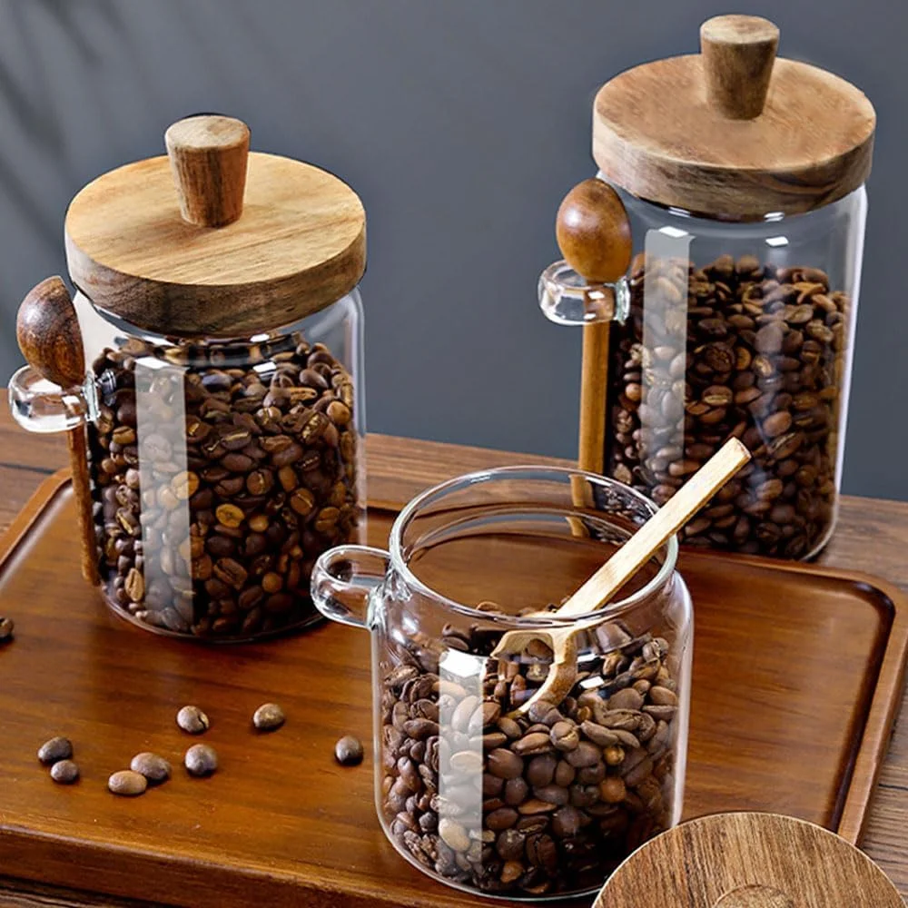 ظرف شیشه ای با درب چوبی و پیمانه، ظرف قهوه 600 میلی لیتری، ظروف شیشه ای نگهداری مواد غذایی، مناسب برای ادویه جات، حبوبات، مواد خشک و چای