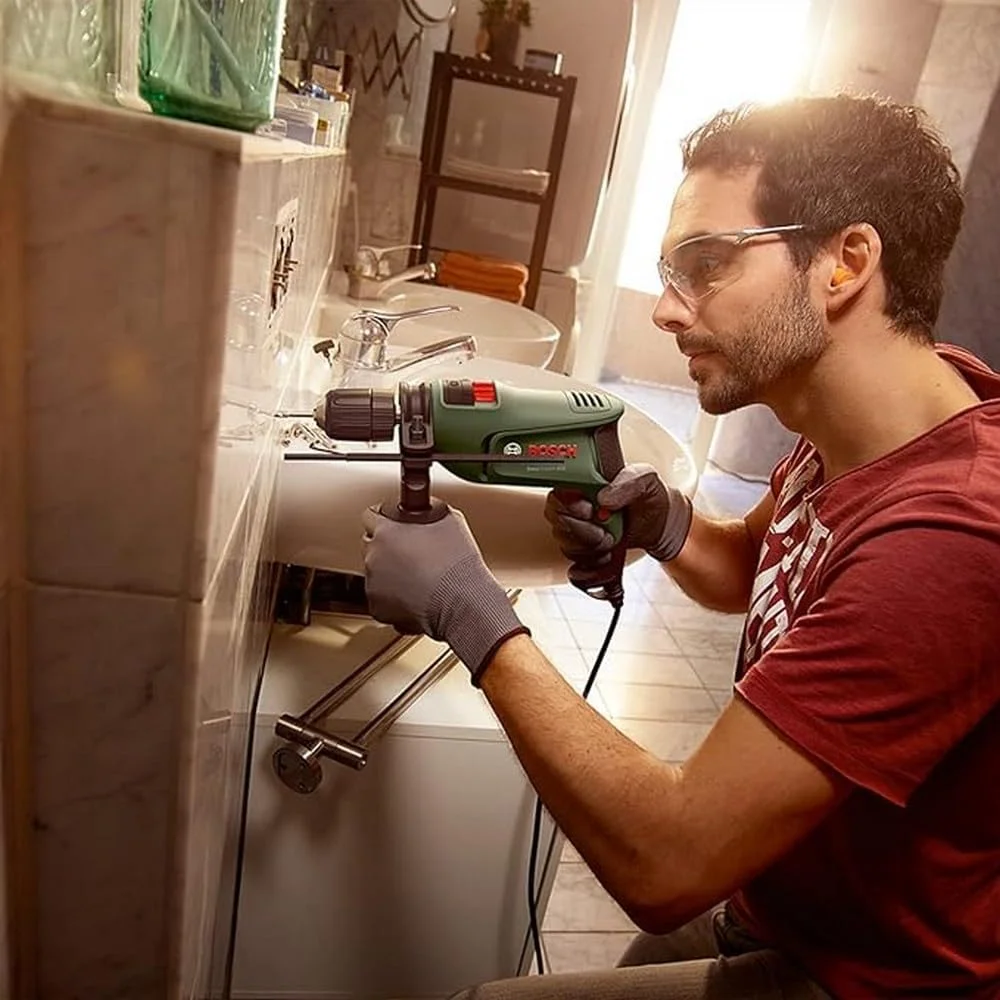 دریل چکشی بوش EasyImpact 600 (600 وات، در جعبه) دریل چکشی بوش EasyImpact 600 (600 وات، در جعبه)