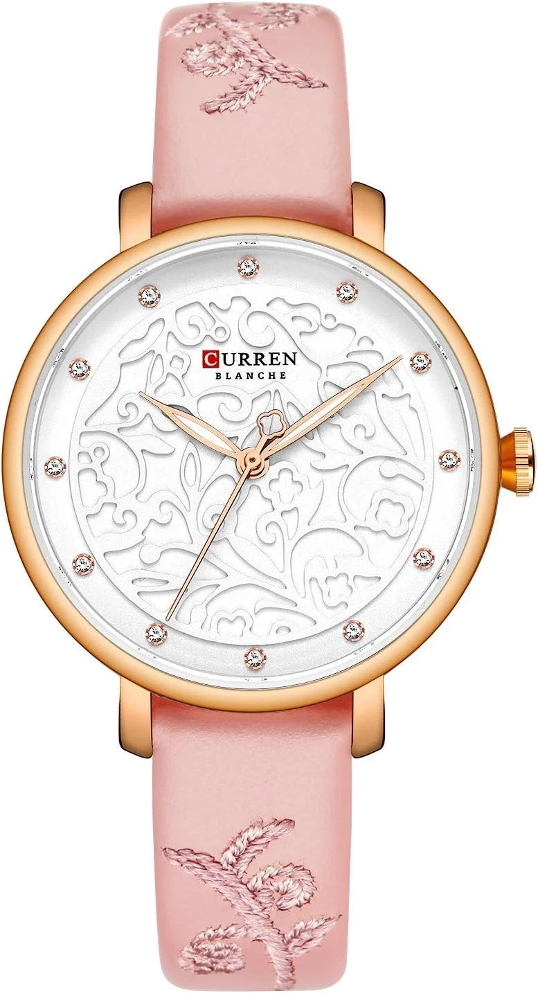 ساعت مچی زنانه کورن مدل 9046 با طرح گل های حکاکی شده و بند چرمی PU و استیل ضد زنگ، ضد آب و مناسب استفاده روزمره