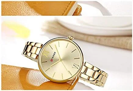 ساعت مچی زنانه عقربه ای کورن مدل 9017 با بند فلزی (بند استیل ضد زنگ) ضد آب - طلایی