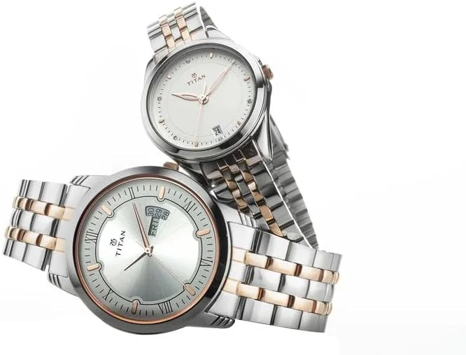 ساعت مچی ست تایتان بندان صفحه نقره ای سفید بند استیل