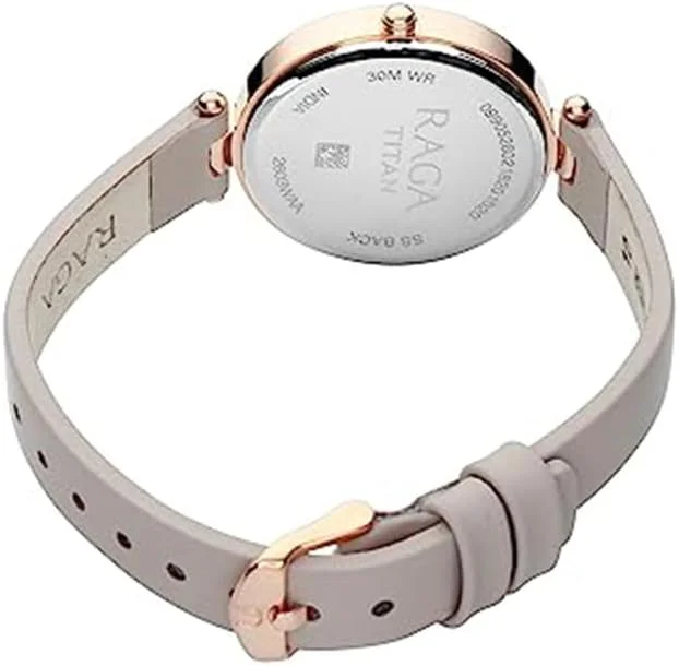 ساعت مچی زنانه آنالوگ Titan Raga Viva با صفحه رزگلد مدل NN2603WL01/NP2603WL01 ساعت مچی زنانه آنالوگ Titan Raga Viva با صفحه رزگلد مدل NN2603WL01/NP2603WL01