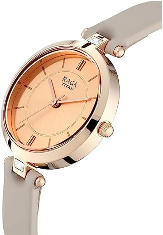 ساعت مچی زنانه آنالوگ Titan Raga Viva با صفحه رزگلد مدل NN2603WL01/NP2603WL01 ساعت مچی زنانه آنالوگ Titan Raga Viva با صفحه رزگلد مدل NN2603WL01/NP2603WL01