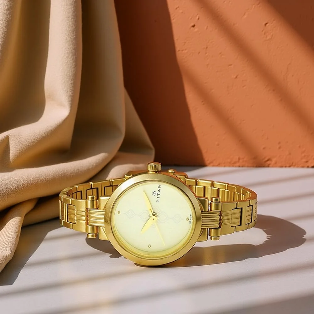 ساعت مچی صفحه شامپاین با بند استیل طلایی ساعت مچی صفحه شامپاین با بند استیل طلایی