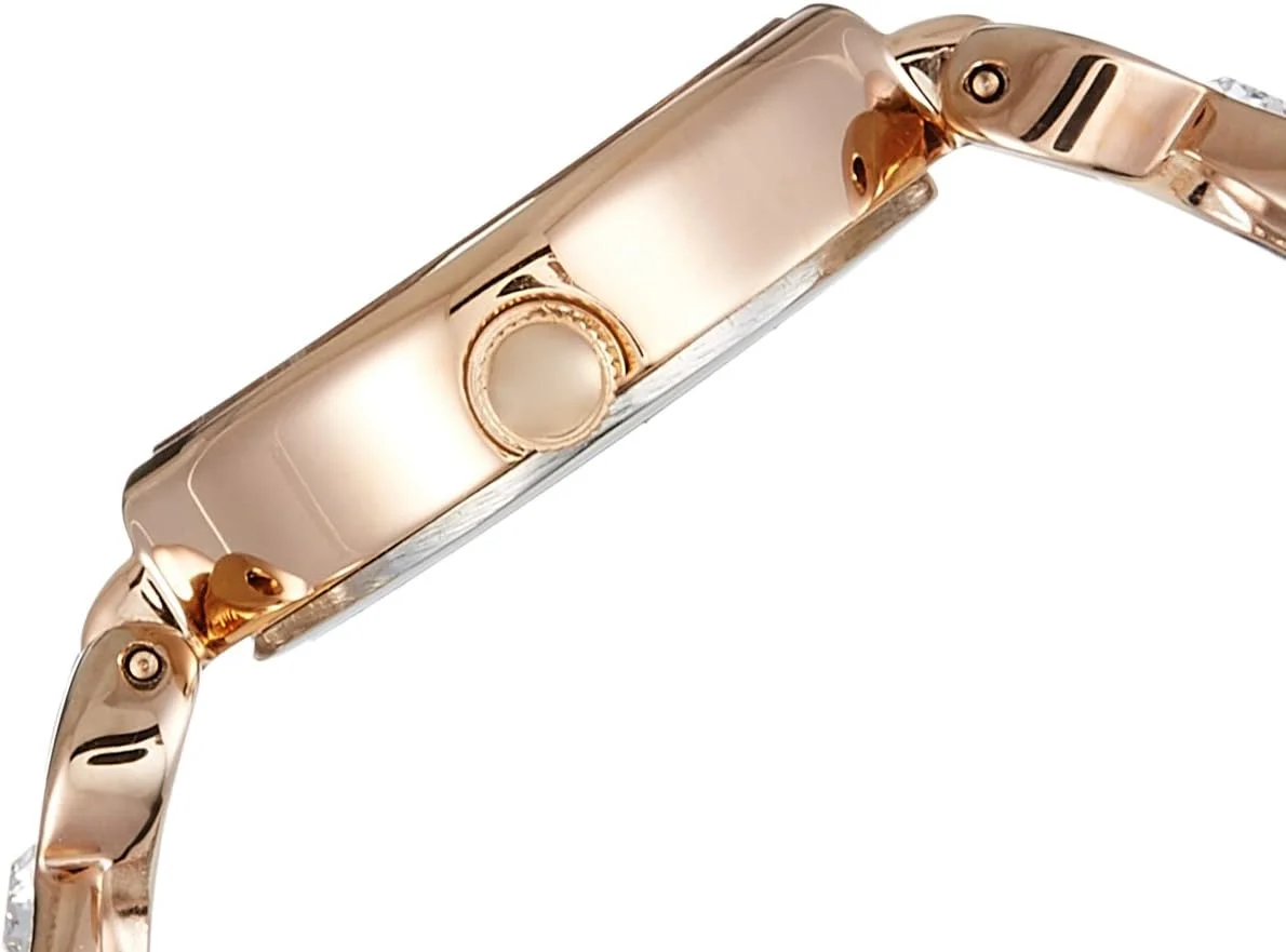 ساعت مچی زنانه آنالوگ تیتان با صفحه صورتی مدل NM2497WM01 / NL2497WM01 / NP2497WM01