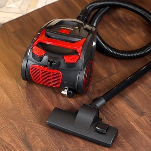 جاروبرقی 2200 وات Geepas مدل GVC19035/ ظرفیت کیسه گرد و غبار 1.5 لیتری، عملکرد جمع کننده خودکار سیم، 2 لوله پلاستیکی/ایده آل برای خانه، دفتر کار، قرمز و مشکی