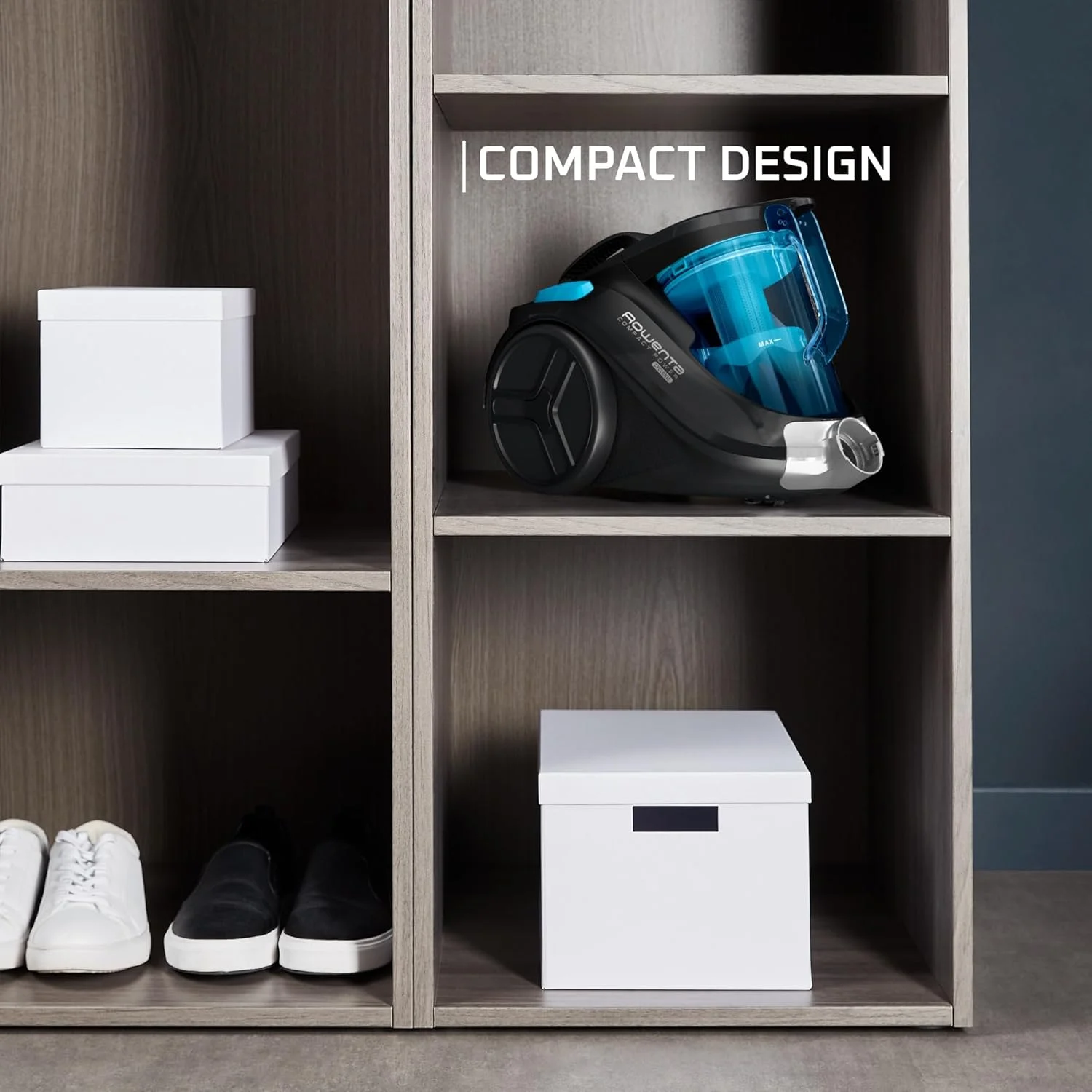 جاروبرقی سایکلونیک کامپکت پاور روونتا مدل RO3731EA، 750 وات، رده انرژی A، بدون کیسه، 1.5 لیتر، فیلتر بسیار کارآمد، مشکی/آبی جاروبرقی سایکلونیک کامپکت پاور روونتا مدل RO3731EA، 750 وات، رده انرژی A، بدون کیسه، 1.5 لیتر، فیلتر بسیار کارآمد، مشکی/آبی