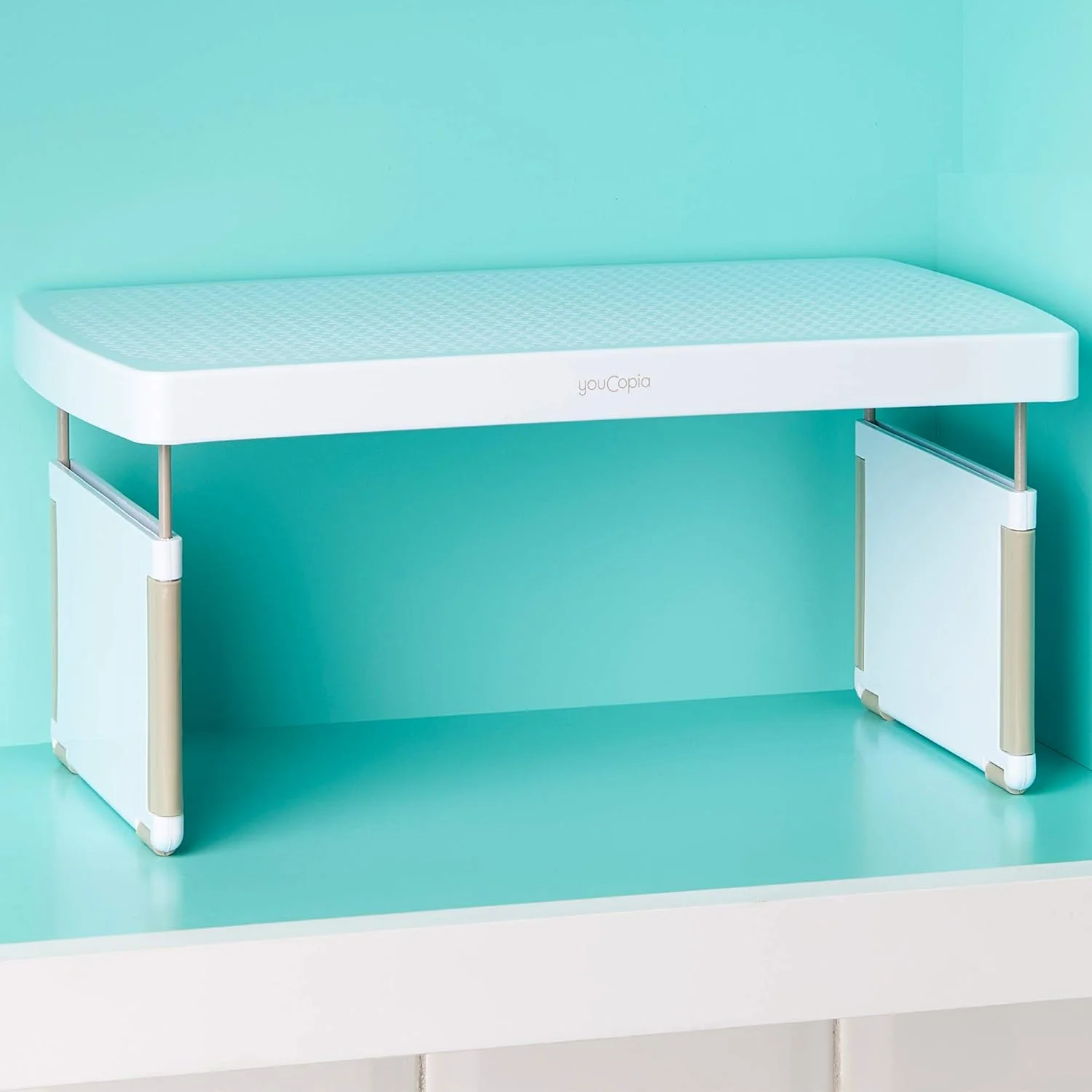 قفسه ارگانایزر کابینت آشپزخانه YouCopia StoreMore با قابلیت افزایش فضا، قفسه قابل تنظیم 13 اینچی برای فنجان، لیوان، بطری، بادوام و صرفه جویی در فضا، سفید - 50089 قفسه ارگانایزر کابینت آشپزخانه YouCopia StoreMore با قابلیت افزایش فضا، قفسه قابل تنظیم 13 اینچی برای فنجان، لیوان، بطری، بادوام و صرفه جویی در فضا، سفید - 50089