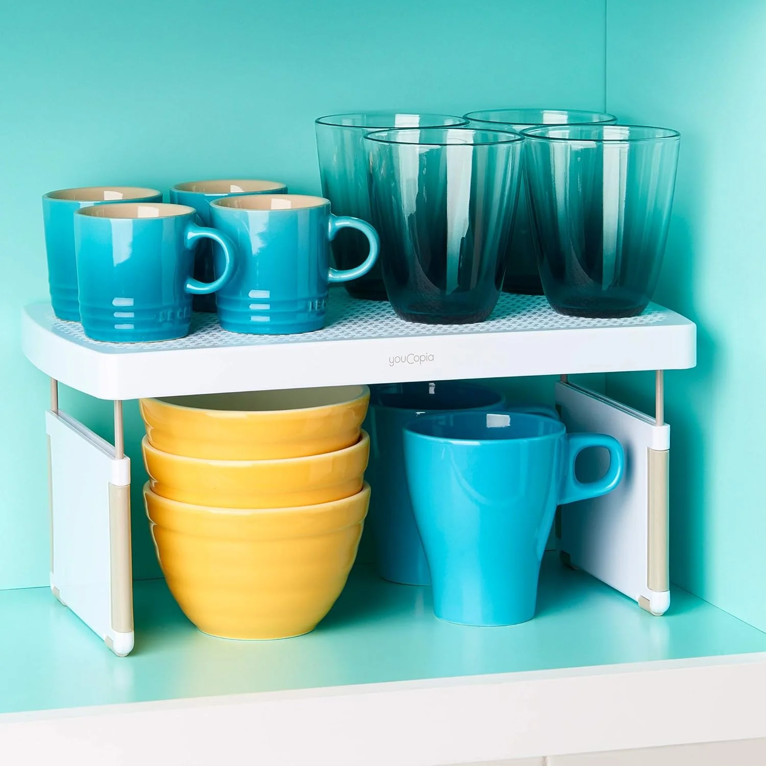 قفسه ارگانایزر کابینت آشپزخانه YouCopia StoreMore با قابلیت افزایش فضا، قفسه قابل تنظیم 13 اینچی برای فنجان، لیوان، بطری، بادوام و صرفه جویی در فضا، سفید - 50089 قفسه ارگانایزر کابینت آشپزخانه YouCopia StoreMore با قابلیت افزایش فضا، قفسه قابل تنظیم 13 اینچی برای فنجان، لیوان، بطری، بادوام و صرفه جویی در فضا، سفید - 50089