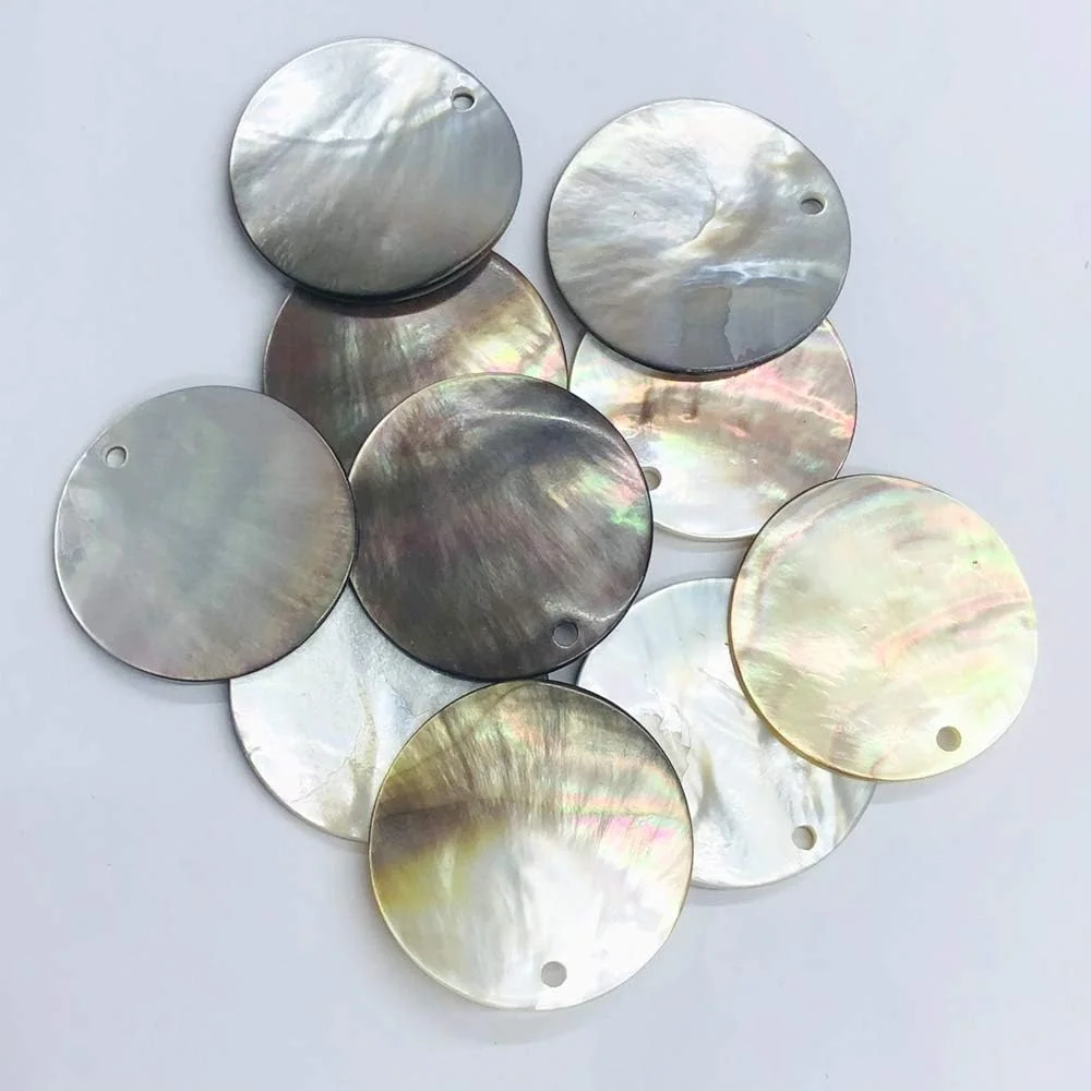 ۱۲ عدد دکمه صدفی مرواریدی طرح مادر، گرد ۴۲ میلی متر، رنگ قهوه ای روشن ۱۲ عدد دکمه صدفی مرواریدی طرح مادر، گرد ۴۲ میلی متر، رنگ قهوه ای روشن