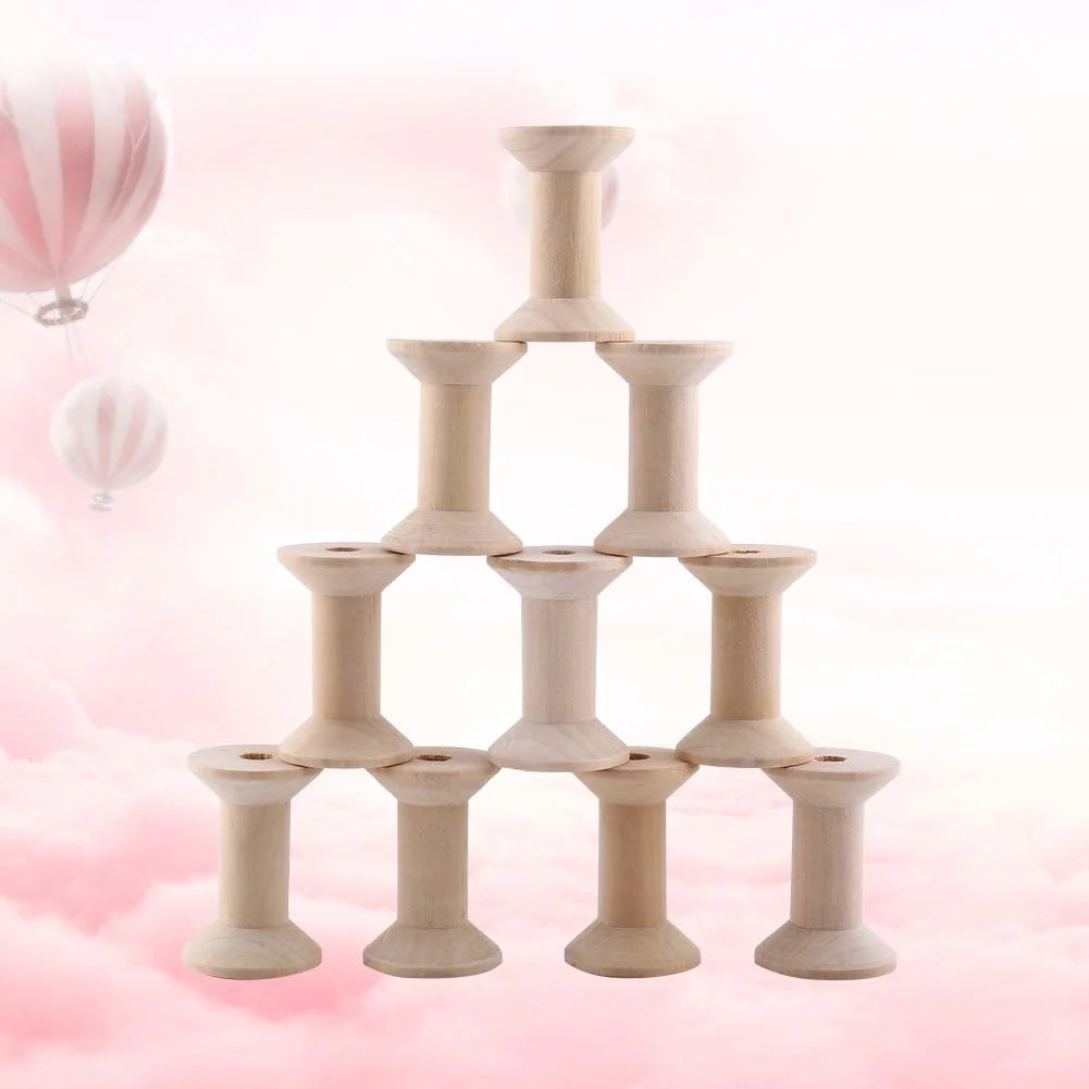 بسته 10 عددی ماسوره چوبی خالی، رنگ چوب، 47mm x 31mm بسته 10 عددی ماسوره چوبی خالی، رنگ چوب، 47mm x 31mm