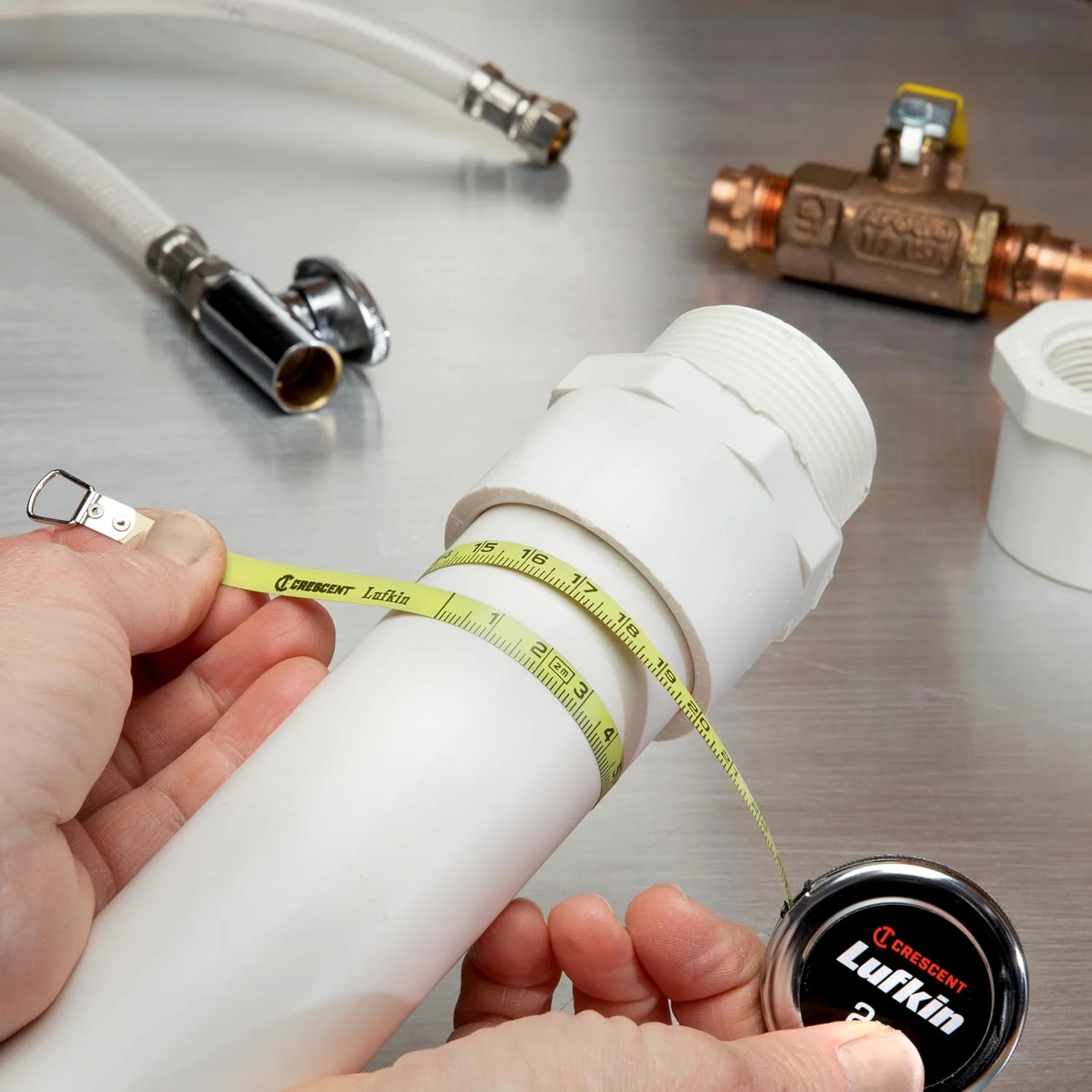 متر جیبی قطر خوان لوفتکین مدل W606Pm Executive، 2 متر در 6 میلی متر، برای اندازه گیری قطرها بر حسب میلی متر، با بدنه کرومی