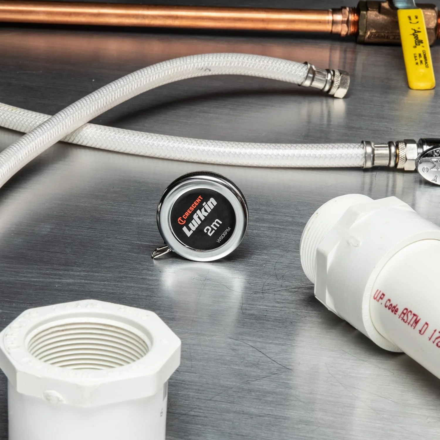 متر جیبی قطر خوان لوفتکین مدل W606Pm Executive، 2 متر در 6 میلی متر، برای اندازه گیری قطرها بر حسب میلی متر، با بدنه کرومی