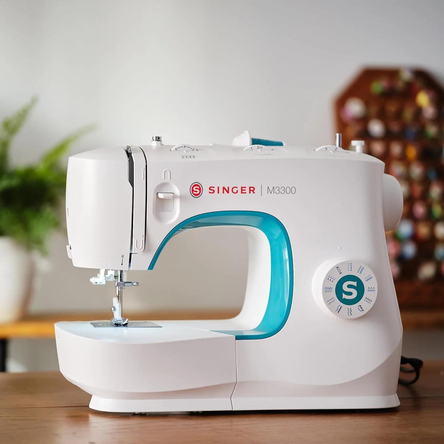 چرخ خیاطی سینگر مدل M3300 با 97 طرح دوخت، بدنه فلزی پلاستیکی، سبز چرخ خیاطی سینگر مدل M3300 با 97 طرح دوخت، بدنه فلزی پلاستیکی، سبز