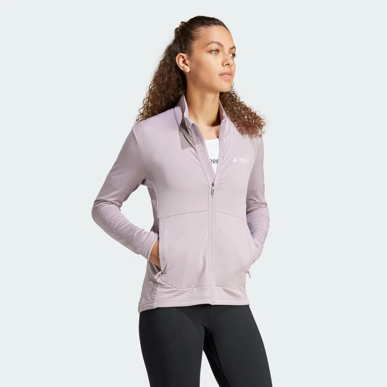 ژاکت پلار زیپدار زنانه آدیداس Terrex Multi Light به رنگ بنفش ژاکت پلار زیپدار زنانه آدیداس Terrex Multi Light به رنگ بنفش