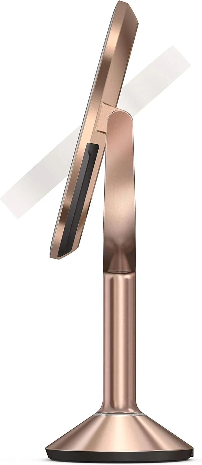 آینه سنسور دار تریو simplehuman، رزگلد. سیستم نور Tru Lux. بزرگنمایی 10X / 5X / 1X. بدون اعوجاج. قابل شارژ. بدون سیم. سنسور حرکتی. آینه سنسور دار تریو simplehuman، رزگلد. سیستم نور Tru Lux. بزرگنمایی 10X / 5X / 1X. بدون اعوجاج. قابل شارژ. بدون سیم. سنسور حرکتی.