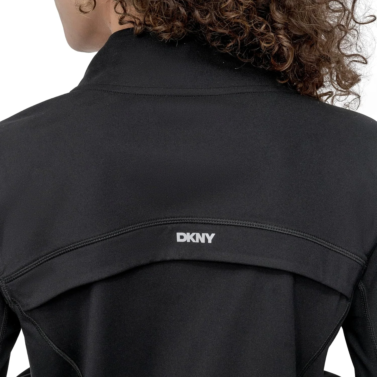 کت ورزشی زنانه DKNY مدل یقه ایستاده، زیپ جلو و فشاری کت ورزشی زنانه DKNY مدل یقه ایستاده، زیپ جلو و فشاری