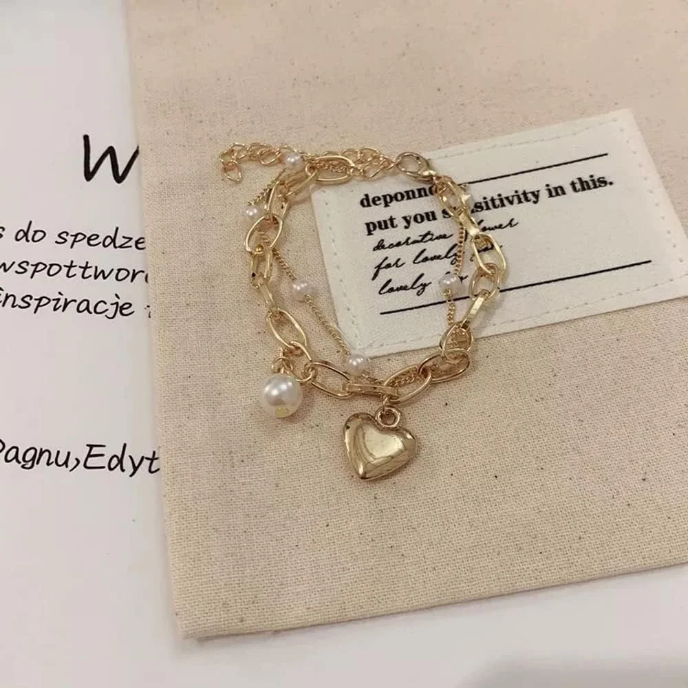 دستبند النگویی شیک و جدید روکش طلایی Shining Diva Fashion برای زنان و دختران (rr14531b)، سایز آزاد، روکش طلایی، بدون سنگ قیمتی دستبند النگویی شیک و جدید روکش طلایی Shining Diva Fashion برای زنان و دختران (rr14531b)، سایز آزاد، روکش طلایی، بدون سنگ قیمتی