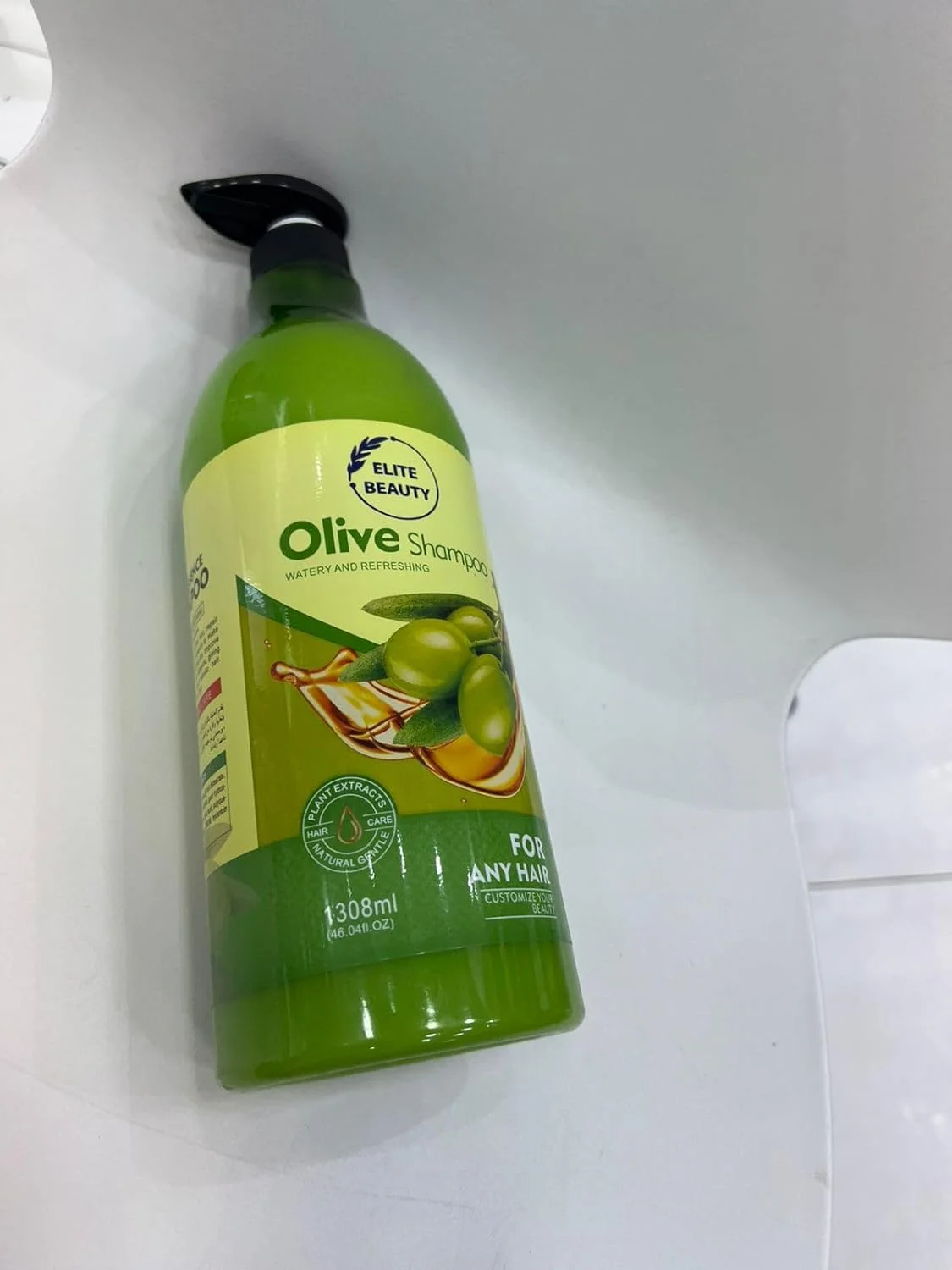 شامپو نرم کننده مغذی زیتون الیت بیوتی، فرمول ضد شوره، 1300 میلی لیتر شامپو نرم کننده مغذی زیتون الیت بیوتی، فرمول ضد شوره، 1300 میلی لیتر