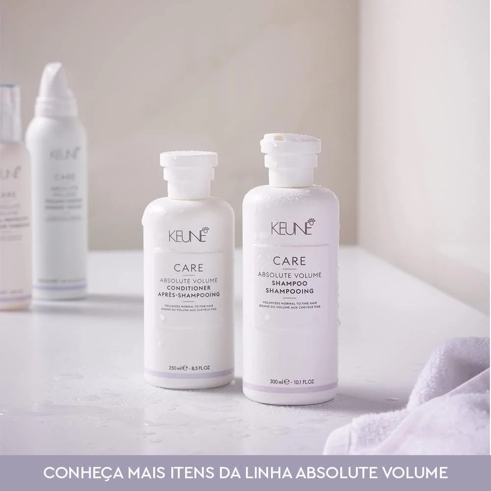 شامپو حجم دهنده موهای نازک کیون مدل کر لاین ابسولوت والیوم 1000 میل شامپو حجم دهنده موهای نازک کیون مدل کر لاین ابسولوت والیوم 1000 میل