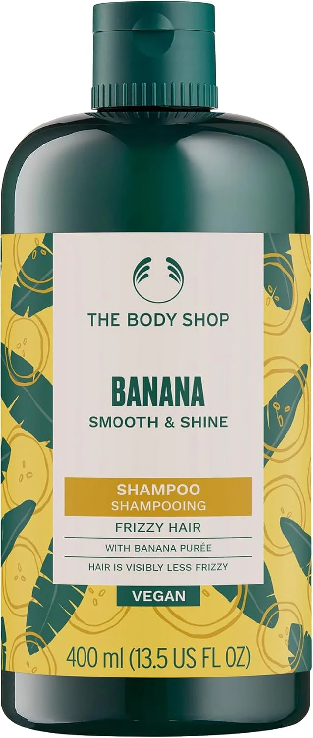 شامپو مغذی موز بادی شاپ (400 میلی لیتر)، شامپو ضد وز مو با عصاره موز، مناسب موهای خشک و مستعد وز، موهای موج دار و فر، کنترل وز مو، مراقبت از مو وگان
